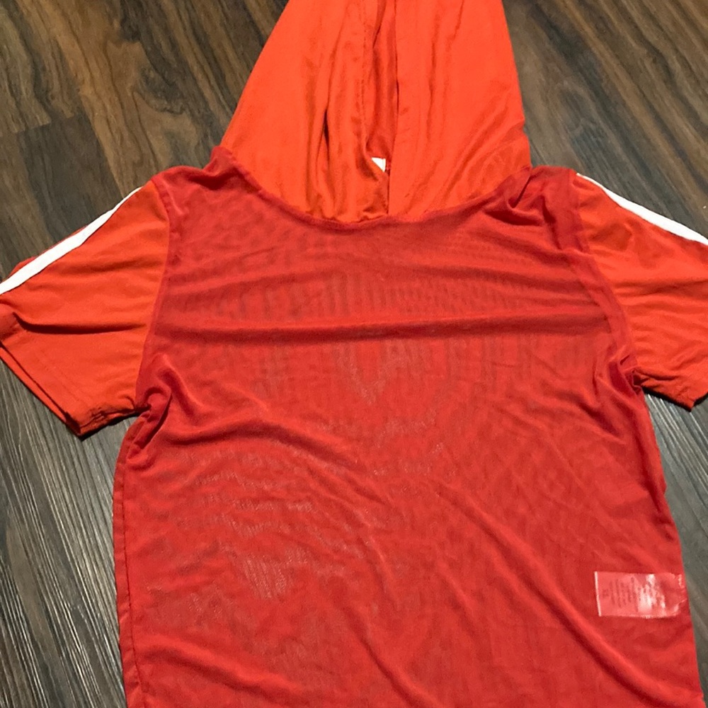 Cute red see through shirt with stripes on the side